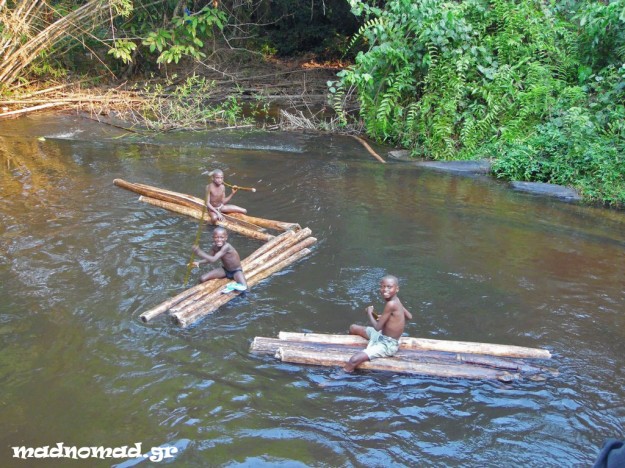 Three tree trunks are enough to make a toy for these children and make them happy!