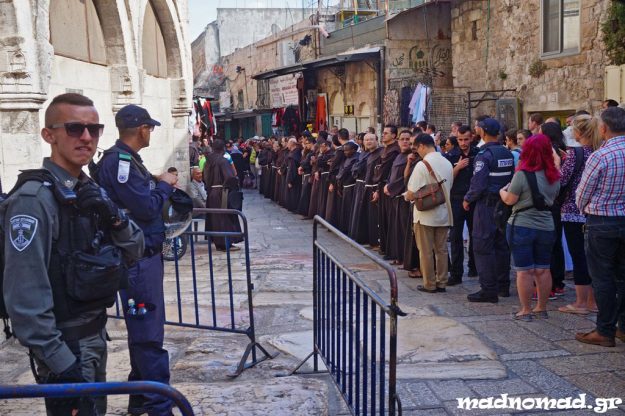 Franciscan monks and pilgrims walk along the Via Dolorosa, the path that Jesus Christ had to take on the way to his crucifixion.